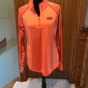 2 OSU shirts and a clear Oklahoma State University purse.